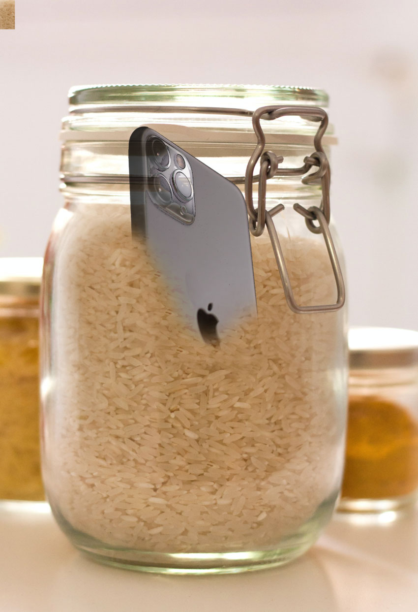 waterlogged phone in a jar of rice drying out